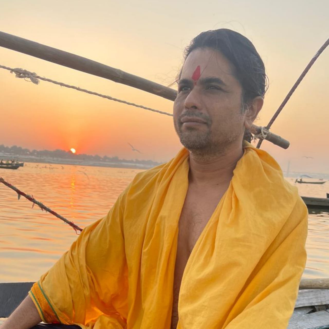 Pt. Vivek Tiwari by the riverside at sunset